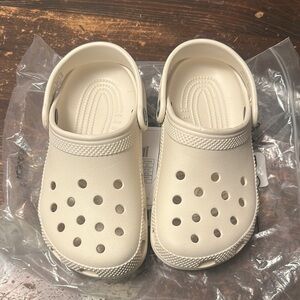 CROCS Cream Sandals with Ventilation and Rotating Heel Strap